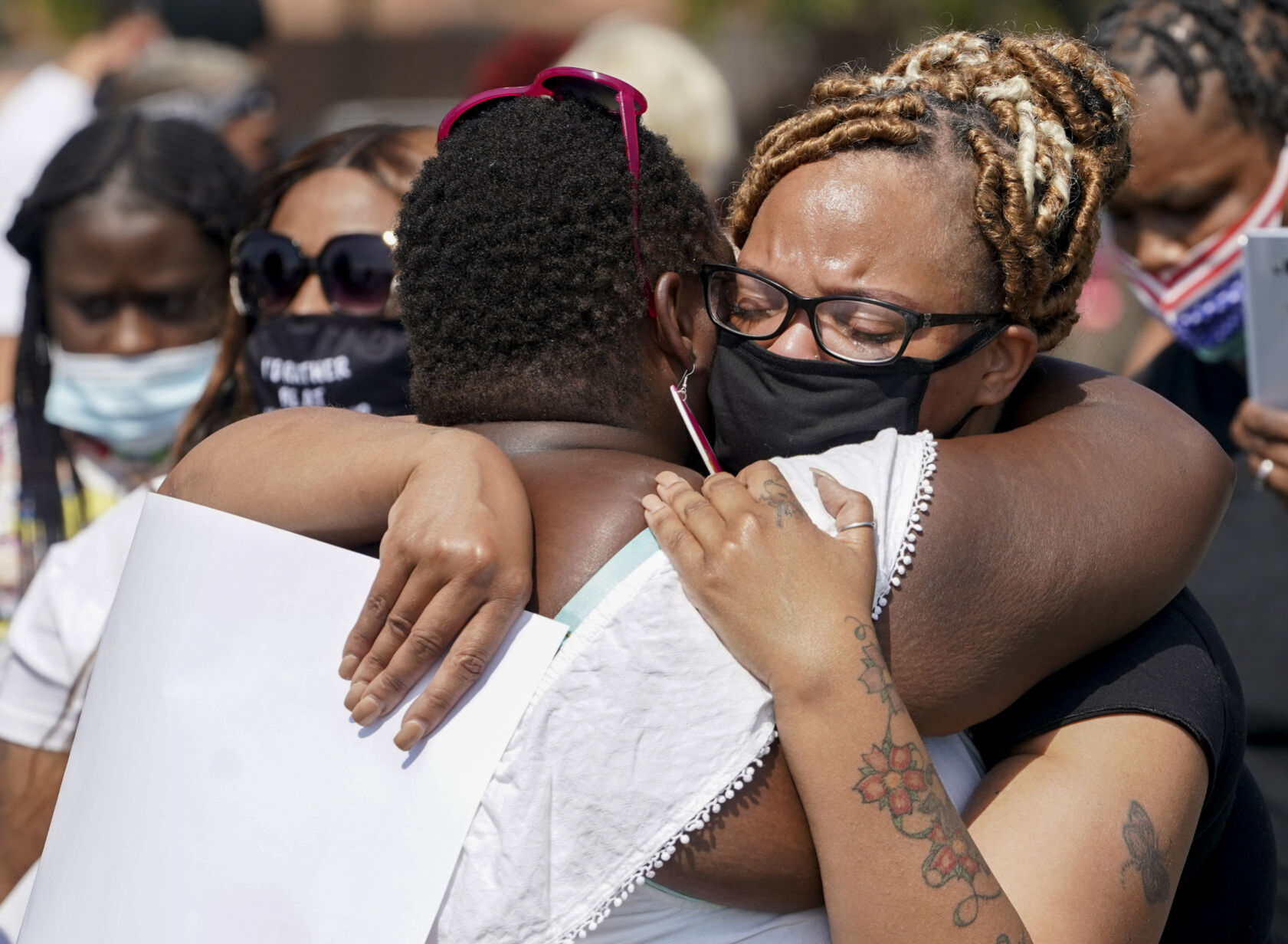 Mourners gather in park